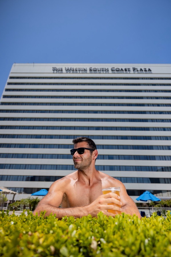 Guest at the pool at The Westin South Coast Plaza
